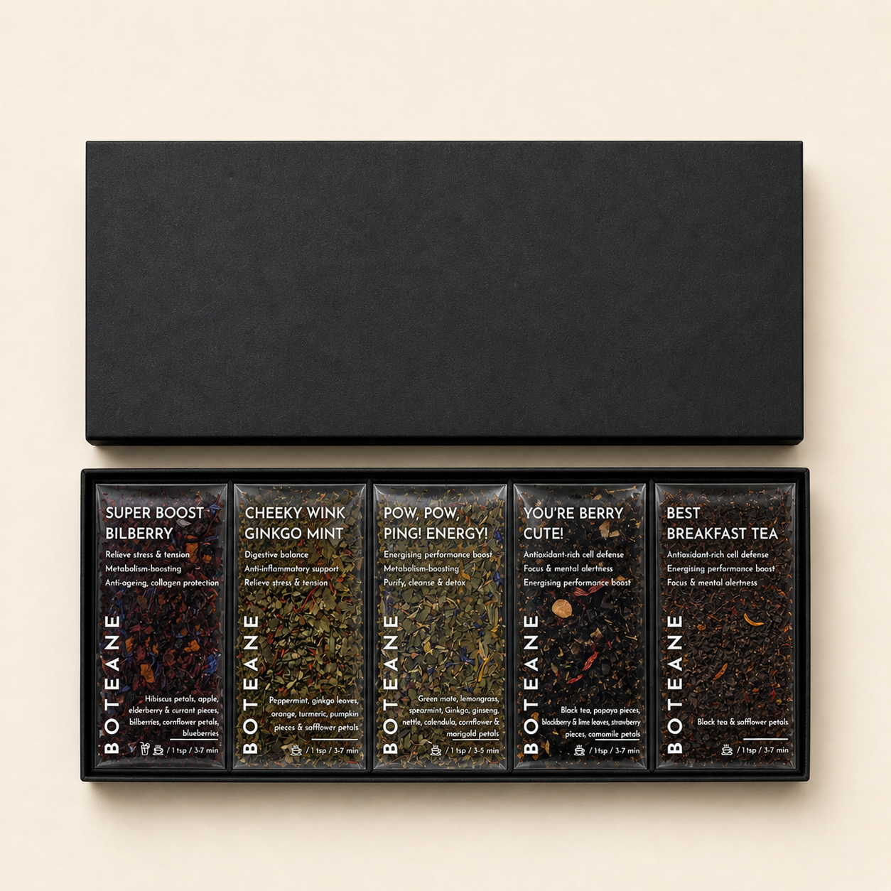 Set of Boteane tea packages in a black box on a beige background