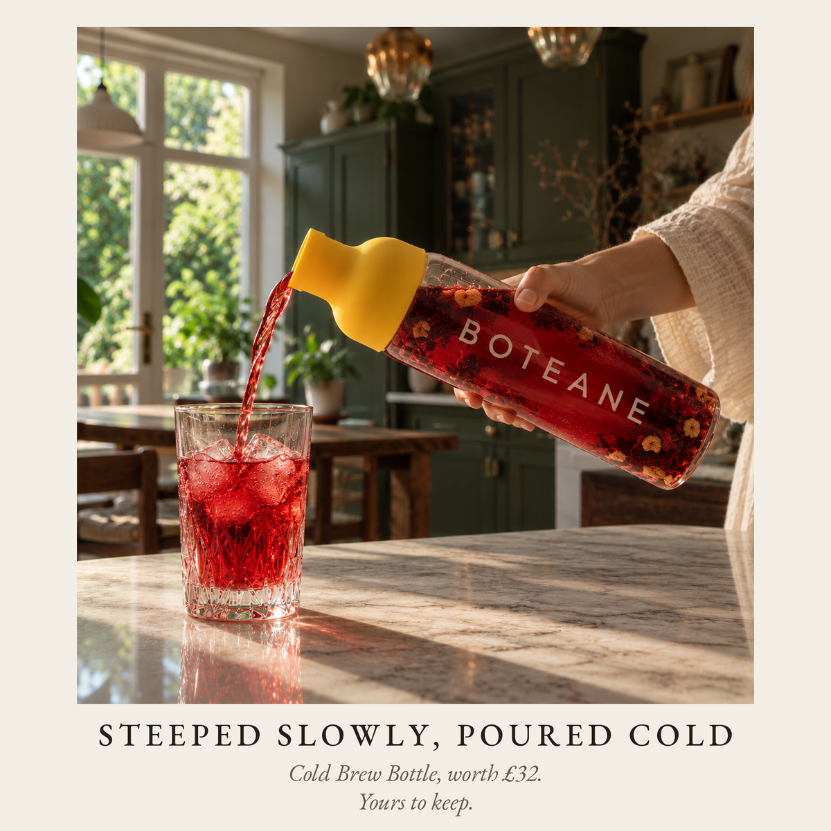 Boteane Ice Tea Cold Brew Bottle with a yellow stopper, filled with red hibiscus cold brew beside a glass of iced tea. Steeped slowly, poured cold. Included with the Welcome Box, worth £32, yours to keep.