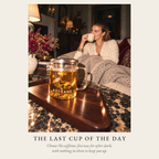 A woman drinking Boteane loose leaf tea on a sofa by lamplight, a glass teapot of flowering tea on the table. The last cup of the day: choose No caffeine, five teas for after dark with nothing in them to keep you up.