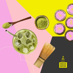 Matcha green tea drink with ice, matcha powder, and matcha packaging on a colorful background.