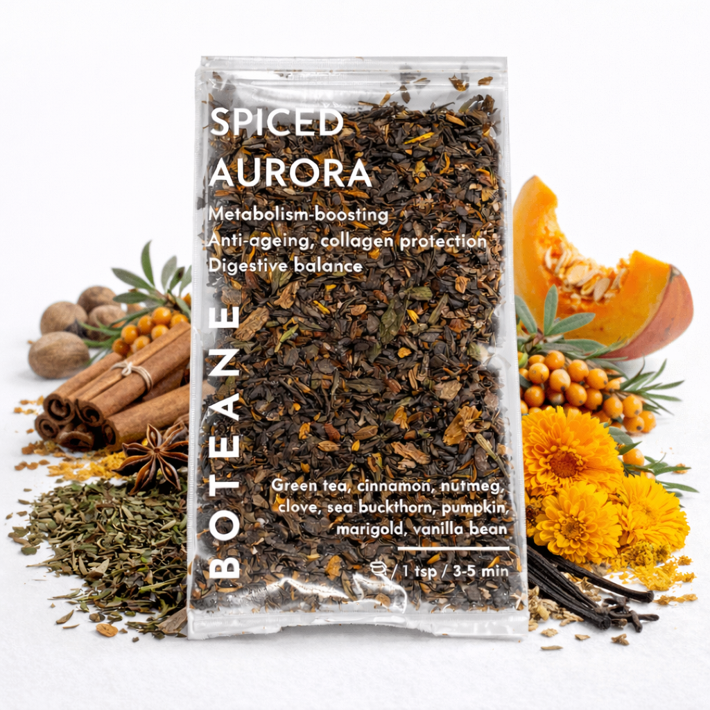 Spiced Aurora tea package with botanicals on a white background