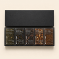 Set of Botane tea boxes with various flavors on a beige background