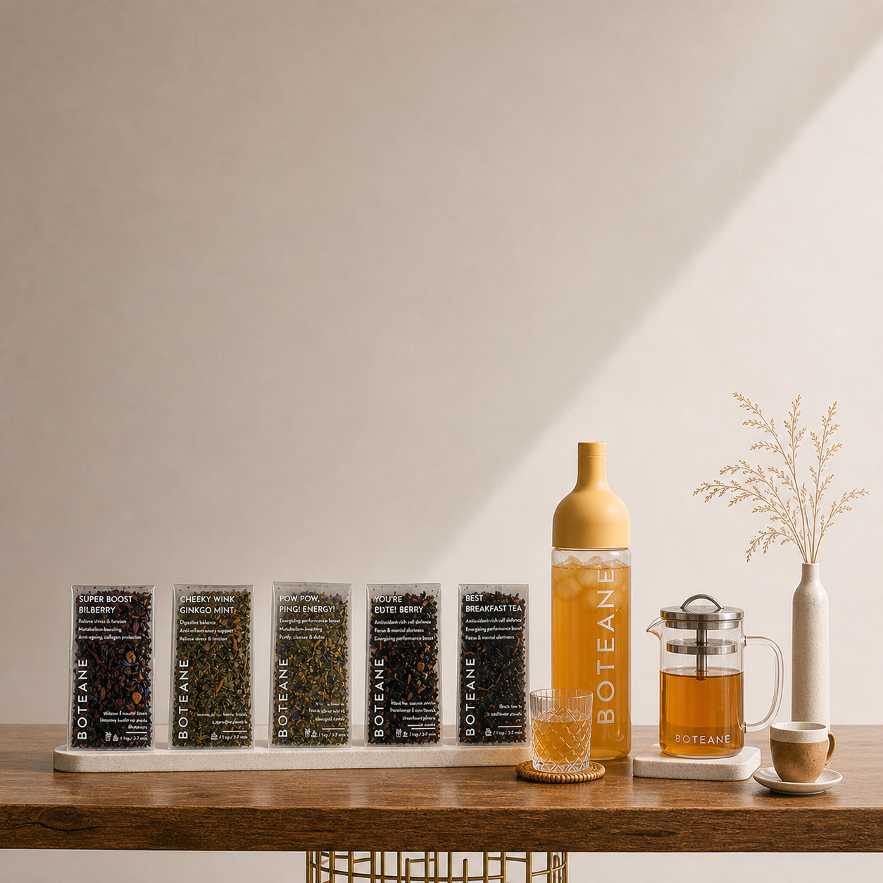 Boteane tea products on a wooden table with a neutral background