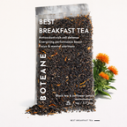 Bag of Boteane Best Breakfast Tea with tea leaves and safflower petals on a white background