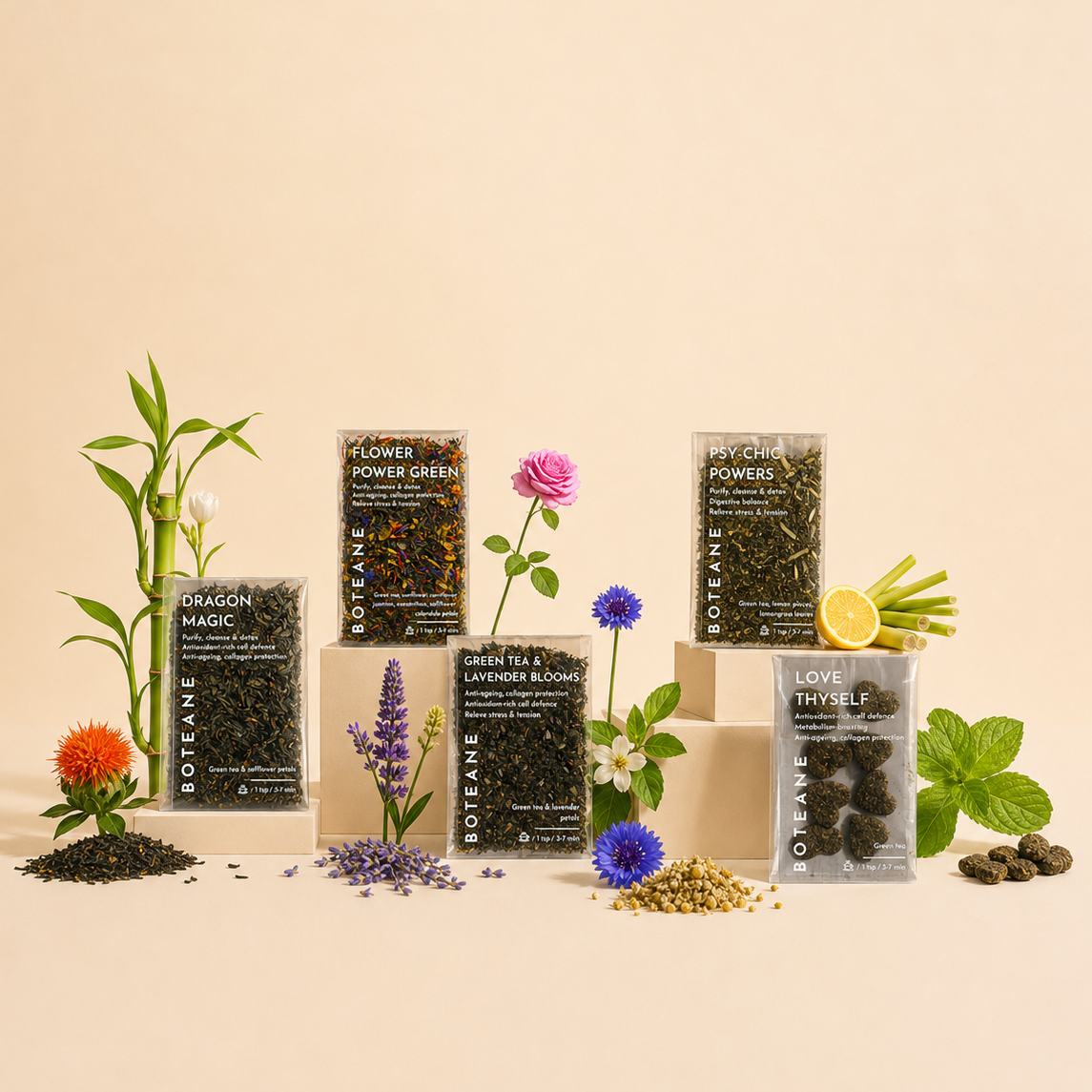Collection of Roanea tea packages with various herbs and flowers on a beige background