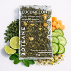 Boteane Cucumelon tea package with green tea, cucumber slices, lime, and carrots on a white background