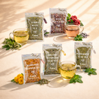 Tea bags with their respective loose leaf teas and brewed cups on a light background