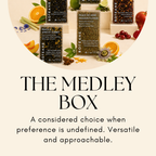 Tea boxes with fruits and flowers on a white background, featuring the text 'The Medley Box'.