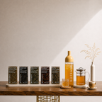 Collection of Botane tea products on a wooden table with a neutral background