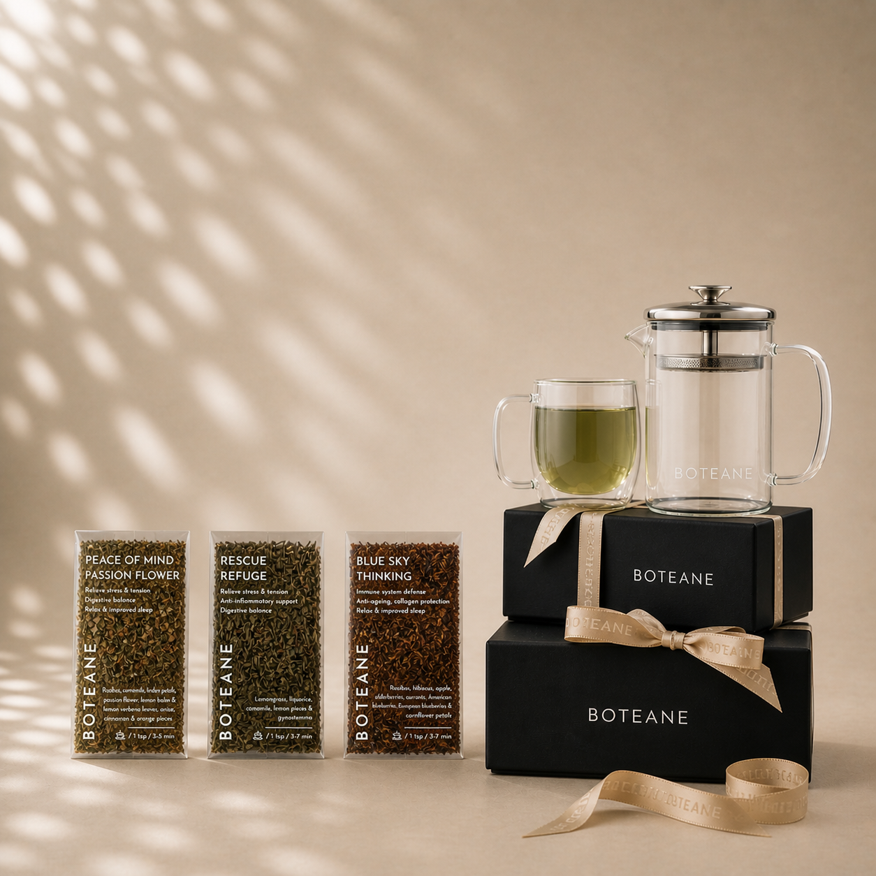 Boteane tea packaging and accessories on a beige background